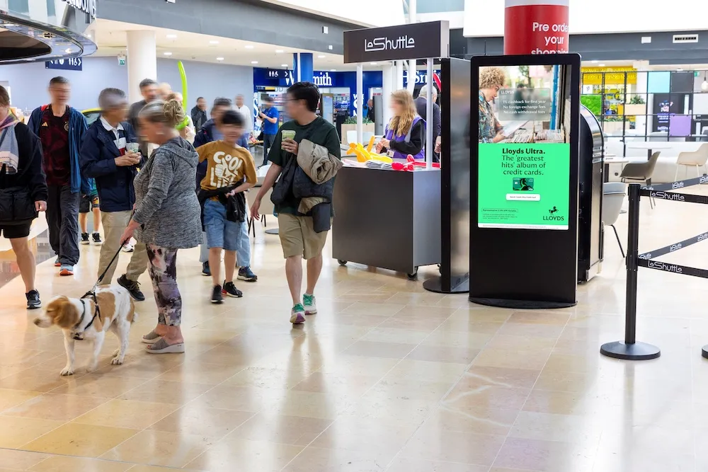 Lloyds Bank advertising on a digital screen at the LeShuttle terminal